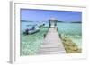 A Wood Pier Leads to Moored Boats and Clear Tropical Waters Near Staniel Cay, Exuma, Bahamas-James White-Framed Photographic Print