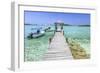 A Wood Pier Leads to Moored Boats and Clear Tropical Waters Near Staniel Cay, Exuma, Bahamas-James White-Framed Photographic Print
