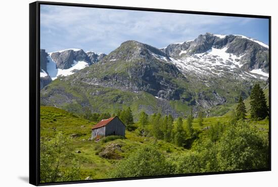 A wooden barn on a hillside below the Frudalsbreen Glacier, Vestlandet-Ellen Rooney-Framed Stretched Canvas