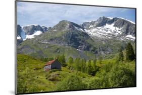 A wooden barn on a hillside below the Frudalsbreen Glacier, Vestlandet-Ellen Rooney-Mounted Photographic Print