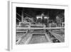 A Worker Stands over a Rock or Gravel Processing Facility, Ca. 1910-null-Framed Photographic Print