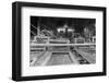 A Worker Stands over a Rock or Gravel Processing Facility, Ca. 1910-null-Framed Photographic Print