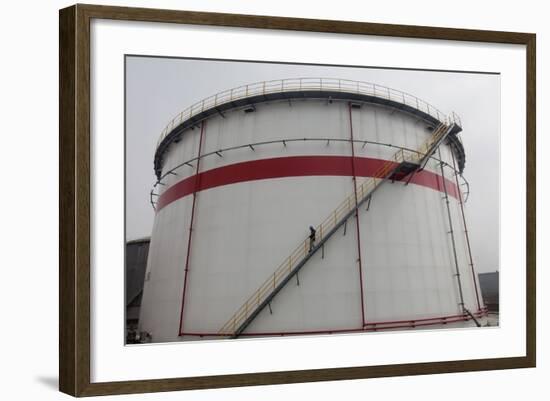 A Worker Walks Down Stairs of an Oil Tank at a Refinery in Wuhan, Hubei Province-Darley Shen-Framed Photographic Print