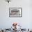 A Worker Walks Down Stairs of an Oil Tank at a Refinery in Wuhan, Hubei Province-Darley Shen-Framed Photographic Print displayed on a wall