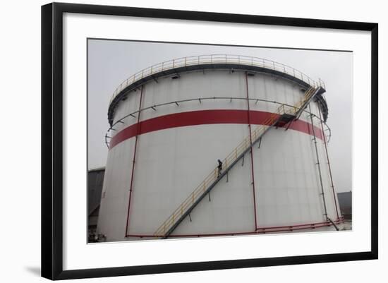 A Worker Walks Down Stairs of an Oil Tank at a Refinery in Wuhan, Hubei Province-Darley Shen-Framed Photographic Print