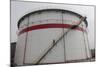 A Worker Walks Down Stairs of an Oil Tank at a Refinery in Wuhan, Hubei Province-Darley Shen-Mounted Photographic Print