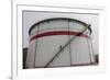 A Worker Walks Down Stairs of an Oil Tank at a Refinery in Wuhan, Hubei Province-Darley Shen-Framed Photographic Print