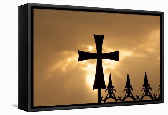 A wrought-iron cross on a fence in Syria at sunrise.-Emily Wilson-Framed Stretched Canvas