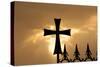 A wrought-iron cross on a fence in Syria at sunrise.-Emily Wilson-Stretched Canvas