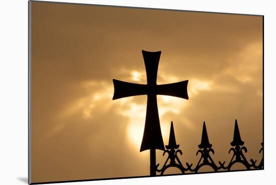 A wrought-iron cross on a fence in Syria at sunrise.-Emily Wilson-Mounted Photographic Print