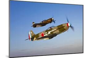 A Yakovlev Yak-9 Fighter Plane and a P-51A Mustang in Flight-null-Mounted Photographic Print