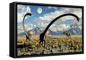 A Yangchuanosaurus Dinosaur Stalking an Omeisaurus-null-Framed Stretched Canvas