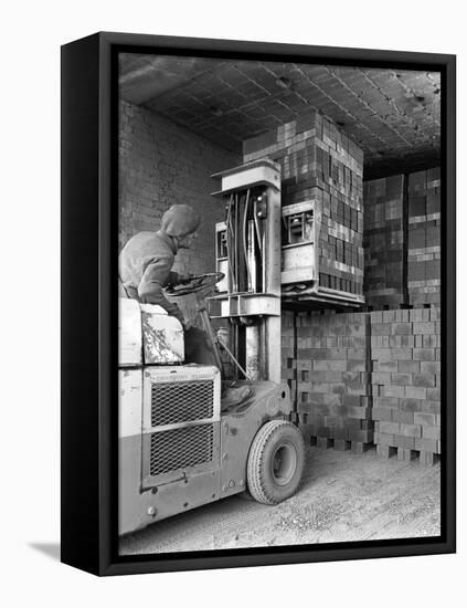A Yardsman Stacking Pallets of Bricks, Whitwick Brickworks, Coalville, Leicestershire, 1963-Michael Walters-Framed Stretched Canvas