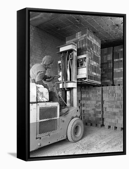 A Yardsman Stacking Pallets of Bricks, Whitwick Brickworks, Coalville, Leicestershire, 1963-Michael Walters-Framed Stretched Canvas