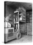 A Yardsman Stacking Pallets of Bricks, Whitwick Brickworks, Coalville, Leicestershire, 1963-Michael Walters-Stretched Canvas