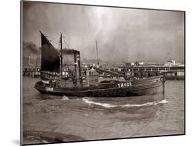 A Yarmouth Herring Boat Leaves the Mouth of the River Yar Norfolk, 1935-null-Mounted Premium Photographic Print