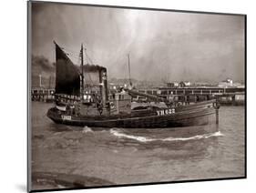 A Yarmouth Herring Boat Leaves the Mouth of the River Yar Norfolk, 1935-null-Mounted Photographic Print