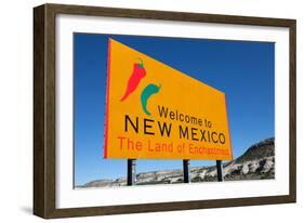 A Yellow Welcome to New Mexico Sign in Front of a Blue Sky-flippo-Framed Photographic Print