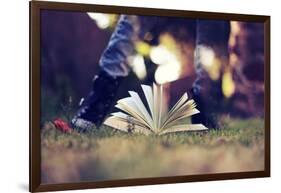 A Young Adult Standing over an Open Book-Carolina Hernández-Framed Photographic Print