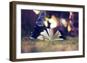 A Young Adult Standing over an Open Book-Carolina Hernández-Framed Photographic Print