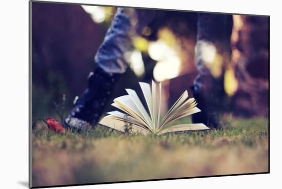 A Young Adult Standing over an Open Book-Carolina Hernández-Mounted Photographic Print