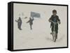 A Young Afghan Boy Rides His Bicycle on a Snow Covered Street-null-Framed Stretched Canvas