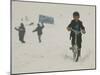 A Young Afghan Boy Rides His Bicycle on a Snow Covered Street-null-Mounted Photographic Print