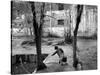 A Young Afghan Girl Carries Water from a Well to Her Family-null-Stretched Canvas