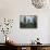 A Young Afghan Refugee Boy Stands in a Pair of Adult's Shoes-null-Photographic Print displayed on a wall