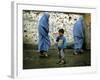 A Young Afghan Refugee Boy Stands in a Pair of Adult's Shoes-null-Framed Photographic Print