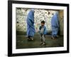 A Young Afghan Refugee Boy Stands in a Pair of Adult's Shoes-null-Framed Photographic Print