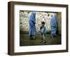 A Young Afghan Refugee Boy Stands in a Pair of Adult's Shoes-null-Framed Photographic Print