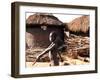 A Young Boy Carries a Hoe-null-Framed Photographic Print
