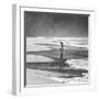 A Young Boy Kicks a Ball on Itamambuca Beach in Ubatuba, Brazil-Alex Saberi-Framed Premium Photographic Print