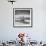 A Young Boy Kicks a Ball on Itamambuca Beach in Ubatuba, Brazil-Alex Saberi-Framed Premium Photographic Print displayed on a wall