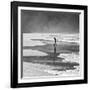 A Young Boy Kicks a Ball on Itamambuca Beach in Ubatuba, Brazil-Alex Saberi-Framed Premium Photographic Print