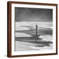 A Young Boy Kicks a Ball on Itamambuca Beach in Ubatuba, Brazil-Alex Saberi-Framed Photographic Print