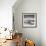 A Young Boy Kicks a Ball on Itamambuca Beach in Ubatuba, Brazil-Alex Saberi-Framed Photographic Print displayed on a wall