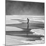 A Young Boy Kicks a Ball on Itamambuca Beach in Ubatuba, Brazil-Alex Saberi-Mounted Photographic Print