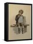 A Young Boy Sits Crying as He Rests His Chin on a Chalkboard-null-Framed Stretched Canvas