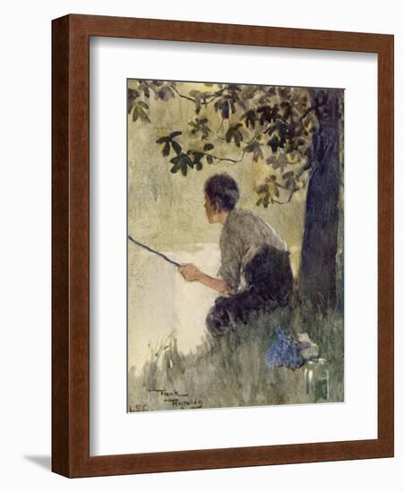 A Young Boy Sits Peacefully Fishing-null-Framed Art Print