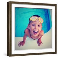 A Young Boy Swimming in a Small Pool-graphicphoto-Framed Photographic Print