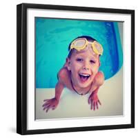 A Young Boy Swimming in a Small Pool-graphicphoto-Framed Photographic Print