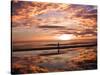 A Young Boy Takes an Early Morning Jog as the Sun Rises Along China Beach-null-Stretched Canvas