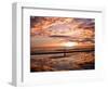 A Young Boy Takes an Early Morning Jog as the Sun Rises Along China Beach-null-Framed Photographic Print