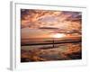 A Young Boy Takes an Early Morning Jog as the Sun Rises Along China Beach-null-Framed Photographic Print