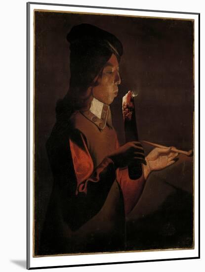 A young boy with a pipe, blowing on a firebrand-Georges De La Tour-Mounted Giclee Print