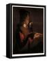 A young boy with a pipe, blowing on a firebrand-Georges De La Tour-Framed Stretched Canvas