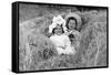 A Young Brother and Sister Nestled in the Hay, Ca. 1900-null-Framed Stretched Canvas