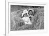 A Young Brother and Sister Nestled in the Hay, Ca. 1900-null-Framed Photographic Print